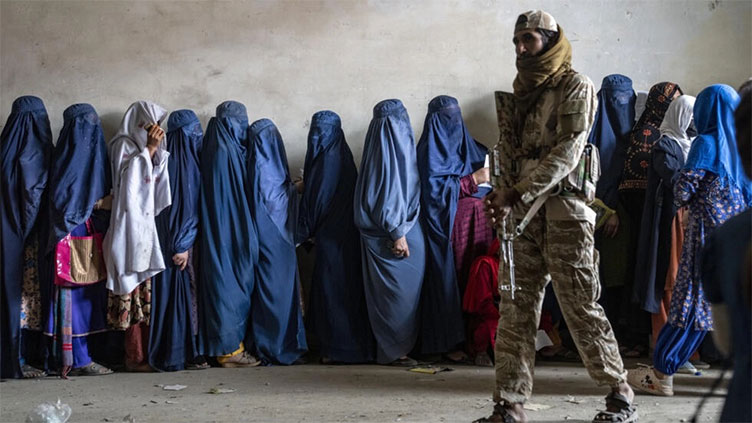 Taliban restricting unmarried women's access to work and travel, UN report says