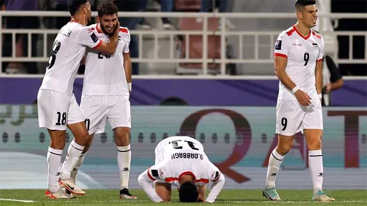 Palestine reaches Asian Cup knockouts for first time after beating Hong Kong 3-0