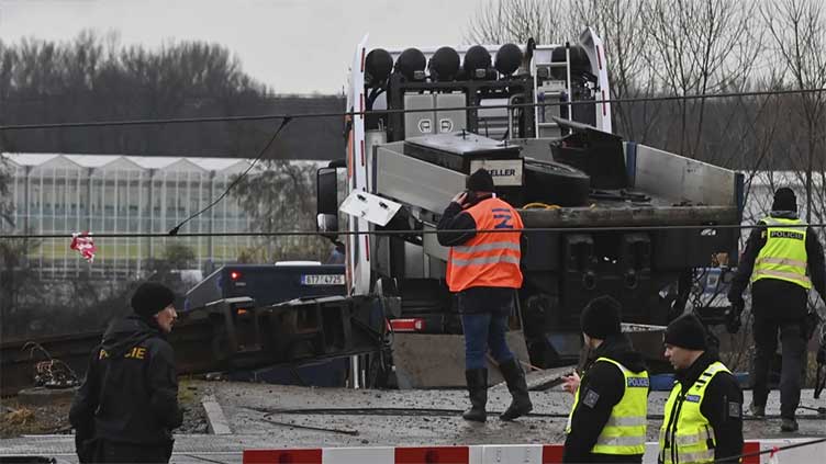 Fast train and a truck collide in eastern Czech Republic, killing 1 and injuring 19 people