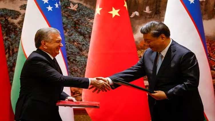 China seals closer Uzbek ties
