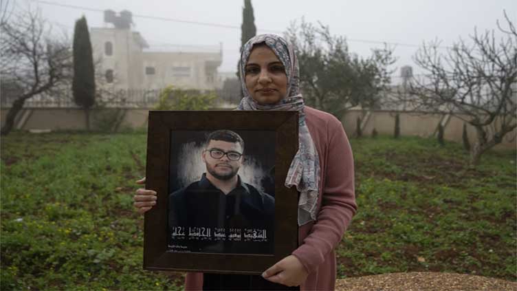 Witness says fatal shooting of American-Palestinian teen in the occupied West Bank was unprovoked