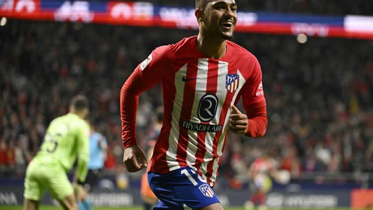 Atletico go third with comfortable Valencia win