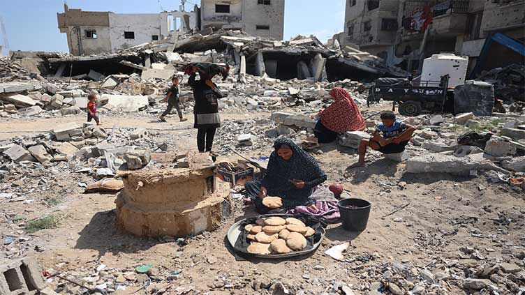 Gaza City's Shujaiya district heavily bombarded for fourth consecutive day