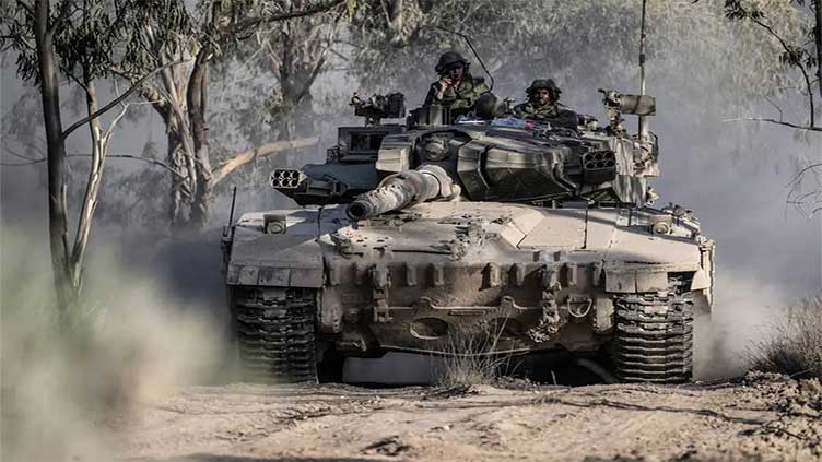 Palestinian group Islamic Jihad fires rockets into Israel, as tanks deepen incursions into Gaza