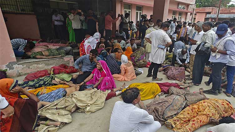 Severe overcrowding, lack of exits and mud contributed to a deadly stampede in India