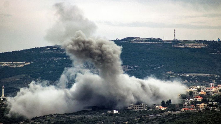 Hezbollah fires rockets at Israeli positions after commander killed