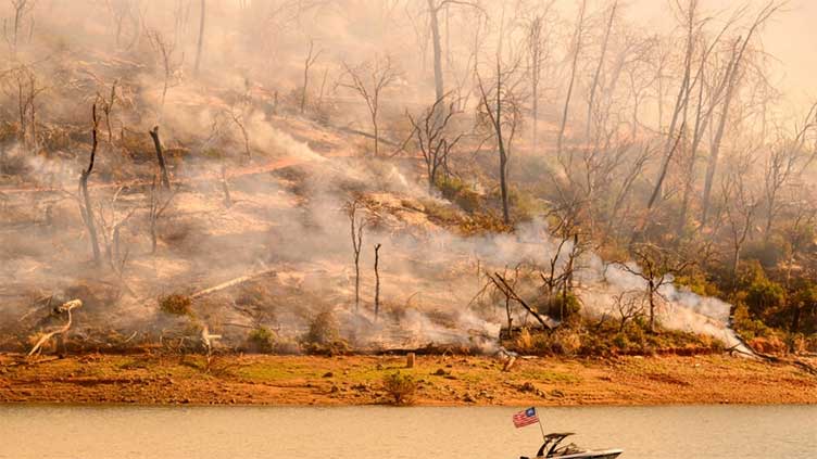 Thousands told to flee raging California wildfire