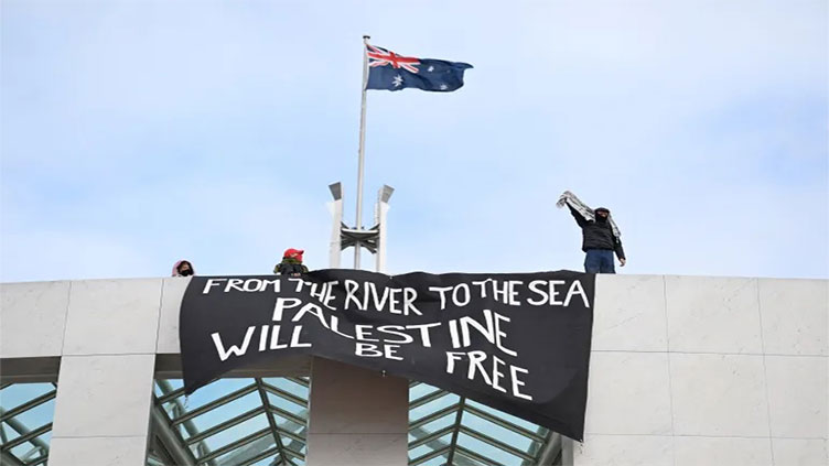 Pro-Palestinian protesters scale roof of Australia's parliament