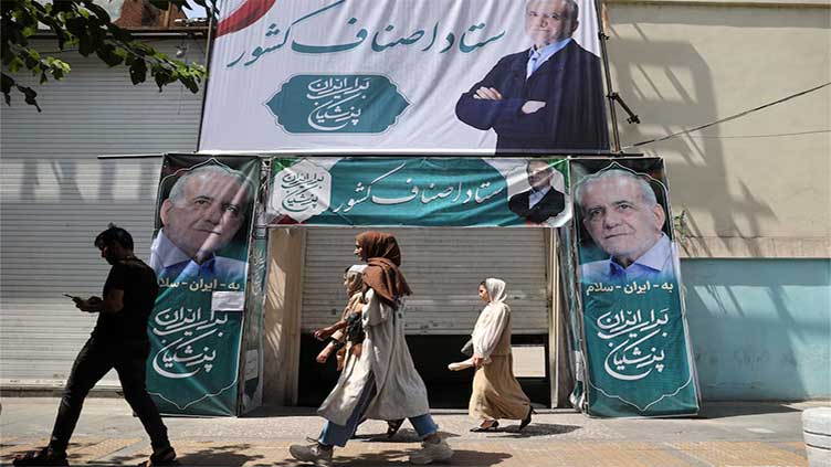 Iranians vote in run-off presidential election amid widespread apathy