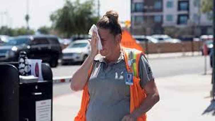 Record temperatures scorch US West as Americans sweat through extreme heat