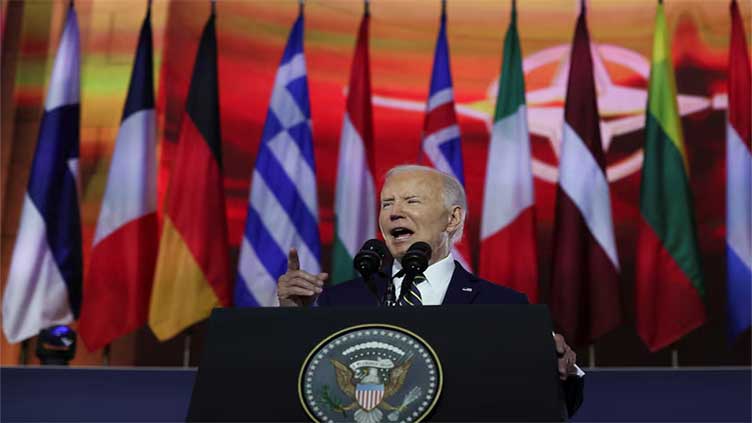 Ukraine will stop Putin, Biden tells NATO in forceful speech