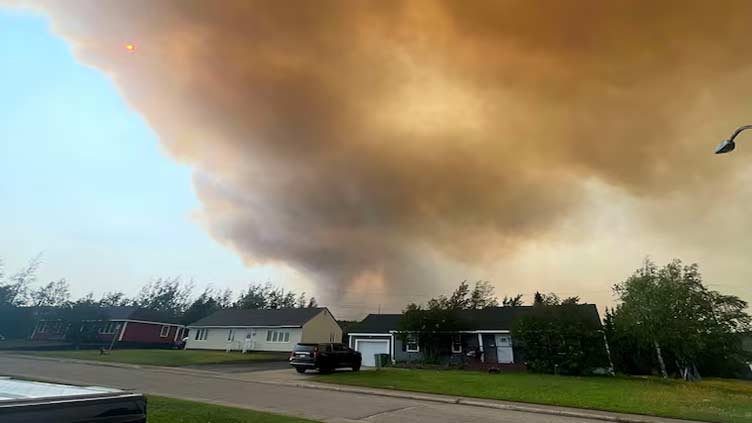 'An extremely aggressive inferno': Fire menaces eastern Canadian community