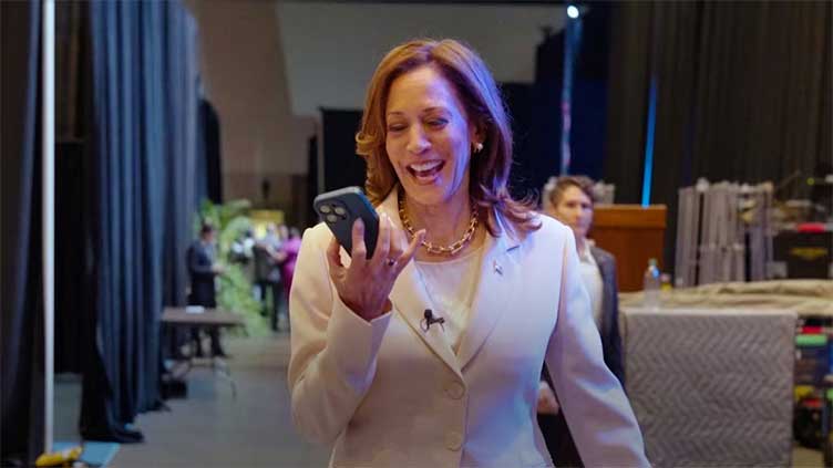 Barack and Michelle Obama endorse Harris in video of live call