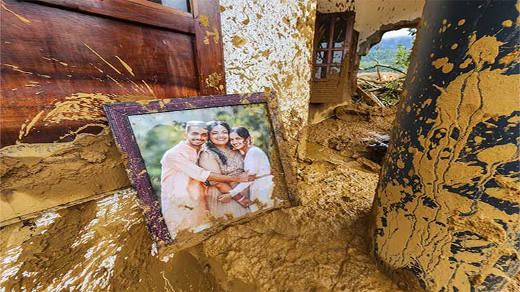 Rescuers search through mud and debris as deaths rise to 151 in landslides in southern India