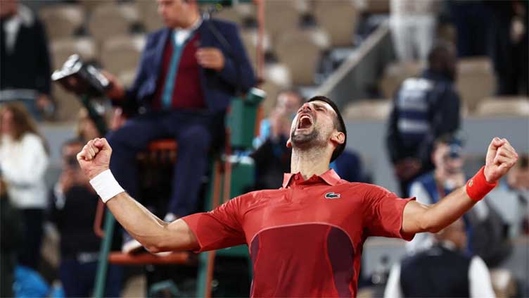 Djokovic into French Open last 16 after early hours five-set epic