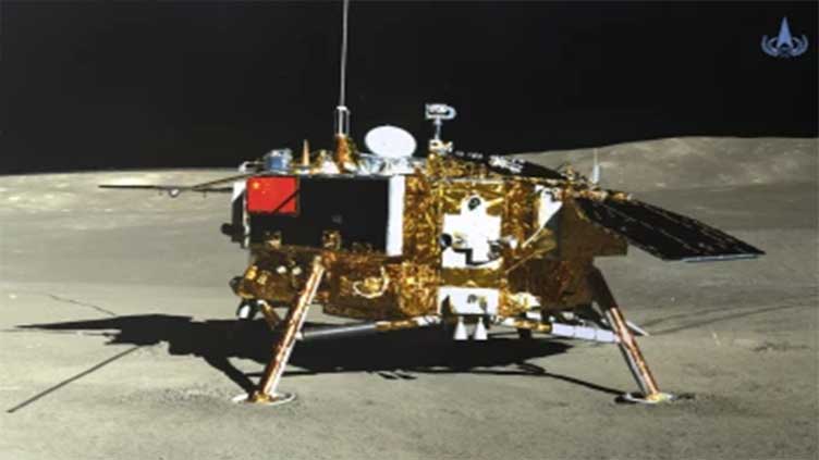 A Chinese spacecraft lands on the moon's far side to collect rocks in growing space rivalry with US