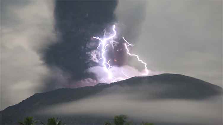 Indonesia's Mt Ibu volcano erupts, spewing clouds of ash