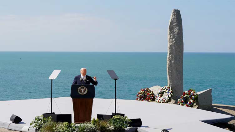 Biden asks Americans to recommit to democracy in Normandy cliff speech