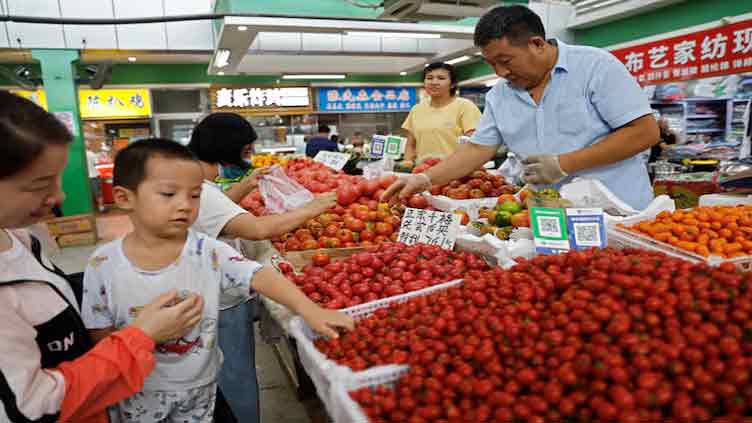 China inflation steady, factory deflation eases 