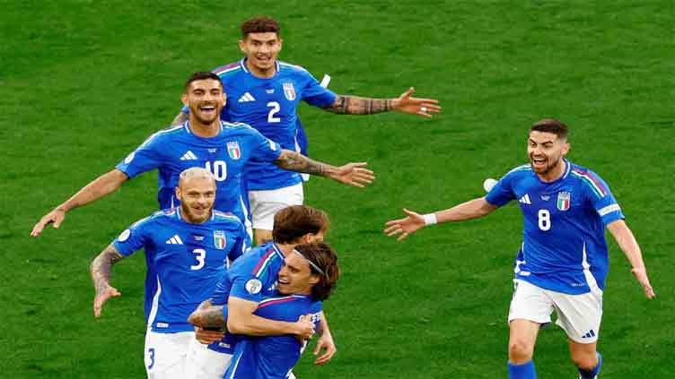 Italy see off Albania after record early scare