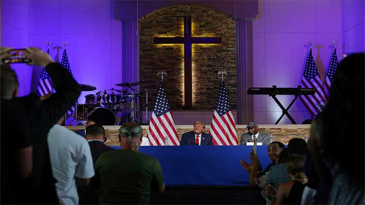 Trump visits Detroit church in bid to court Black voters