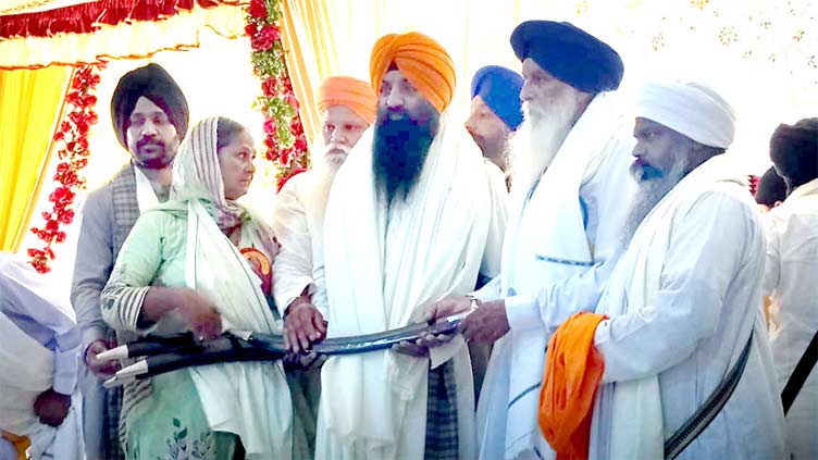 Sikh pilgrims attend death anniversary of Guru Arjan Dev at Gurdwara Dera Sahib