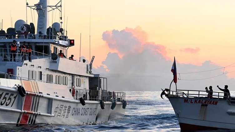 Philippine ship, Chinese vessel collide in disputed South China Sea