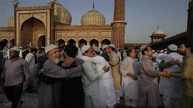 Muslims in Asia celebrate Eid al-Azha with sacrifice festival and traditional feast