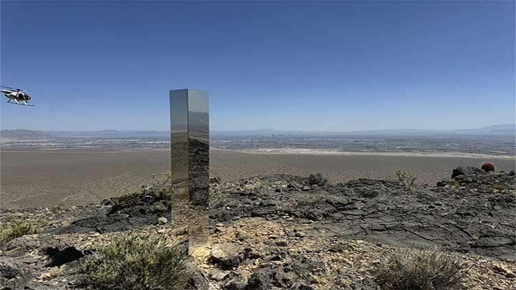 Shiny monolith removed from mountains outside Las Vegas. How it got there remains a mystery