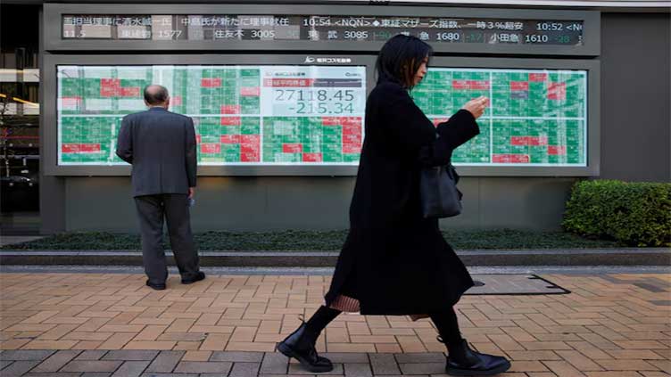 Asian shares wobble as investors wary before US inflation data