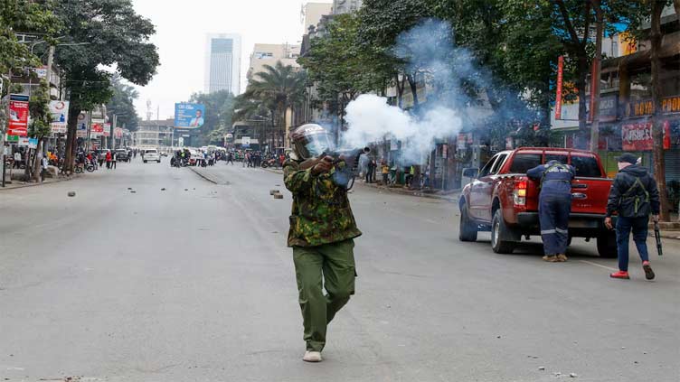 Kenyan police face off against protesters day after president's tax climbdown