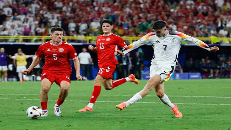 Germany weather storm to beat Denmark and reach quarters