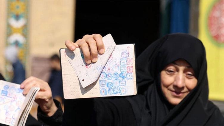 Iranians split on whether to vote or not in elections