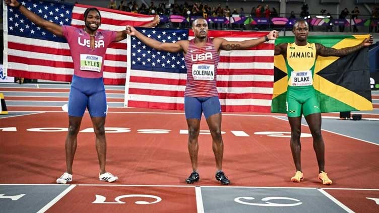 Coleman outsprints Lyles for second world indoor 60m gold