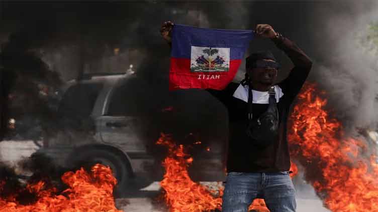 Haitian gang leader vows to 'fight' prime minister, violence surges