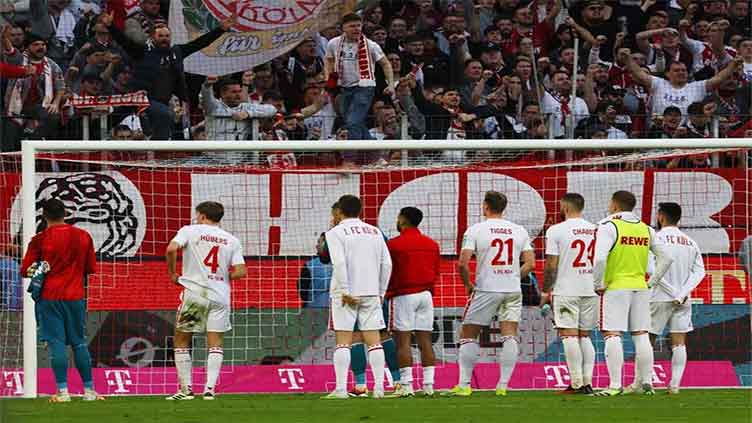 Leverkusen go 10 points clear after 2-0 win over 10-man Cologne