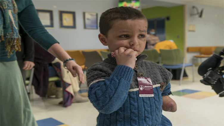 A 4-year-old Gaza boy lost his arm – and his family. Half a world away, he's getting a second chance