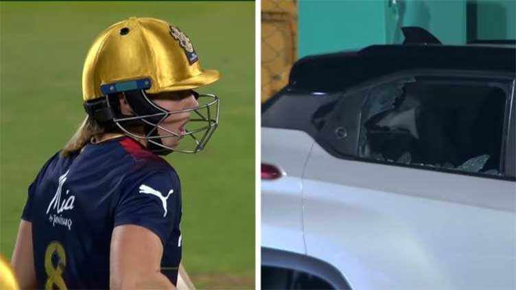 Australia's Perry shatters sponsor's car window with huge six