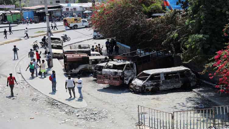 Haiti PM's return still murky as gang conflict worsens