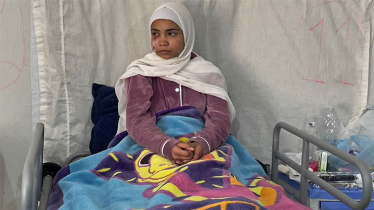 Gaza girl emerges from rubble days after Israeli raid killed family