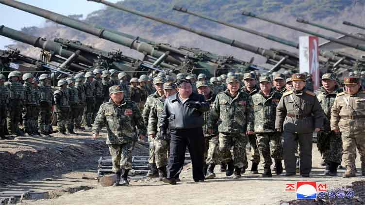 North Korea's Kim guides artillery firing drill, KCNA says
