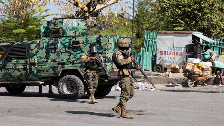 Heavy gunfire near Haiti's National Palace in Port-au-Prince