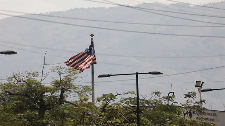 US military airlifts embassy personnel from Haiti, bolsters security
