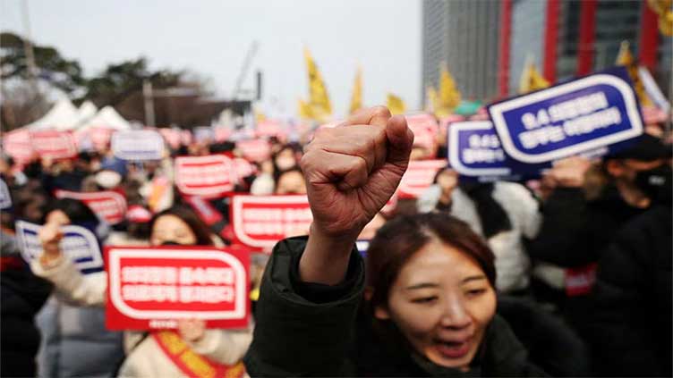 South Korea opens hotline to support doctors defying walkout