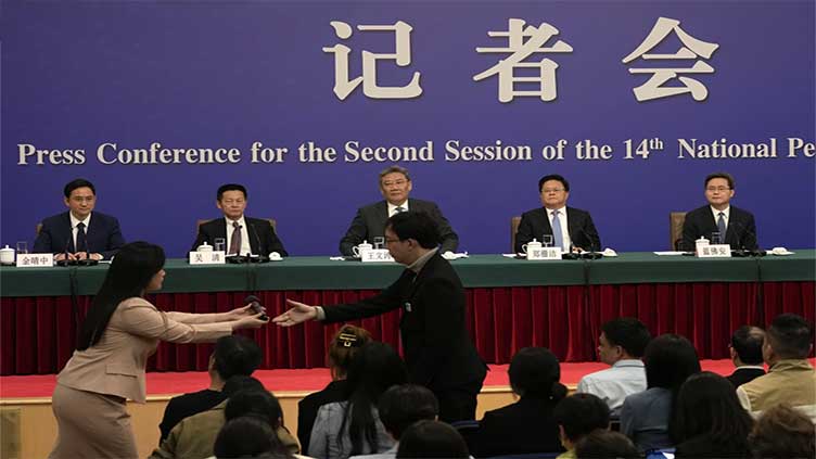 Chinese legislature's meetings return, but the limited openness they once had is gone