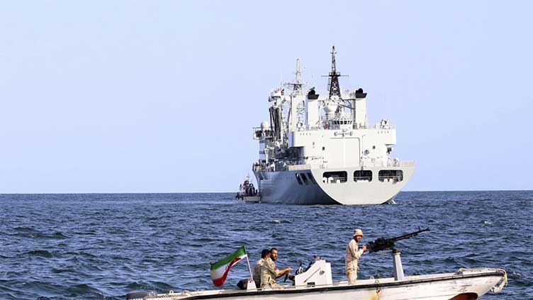 Iran, Russia and China show off their ships in a joint naval drill in the Gulf of Oman