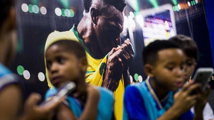 Brazil's Vinicius uses football to stimulate young Brazilian minds