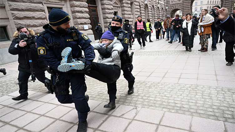 Greta Thunberg blocks Swedish parliament again, removed by police