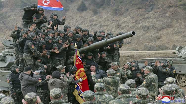 North Korea's Kim test drives a new tank and orders troops to prepare for war