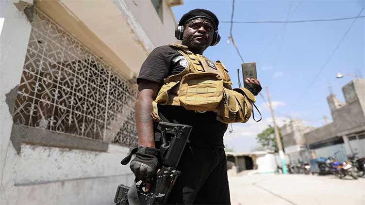 Haiti's top gang leader threatens politicians, capital jail on fire